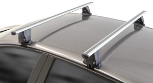 two grey roof bars on a grey vehicle roof