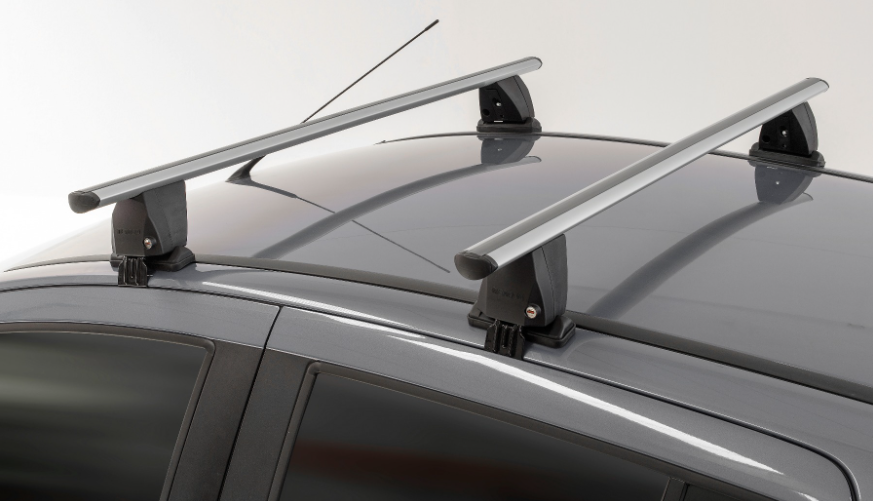 two grey roof bars mounted on a vehicle with black brackets