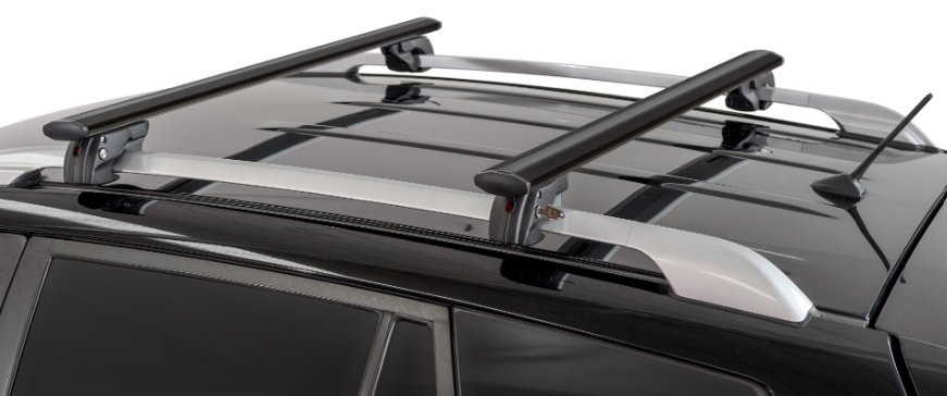 two black roof bars mounted on the vehicle's original bars