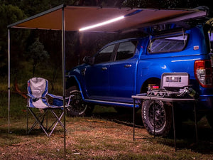 Blue Ford Ranger on a bivouac with an ARB 2500mm side awning