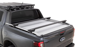 rear view of a grey ford ranger with bars on the front Bed Truck