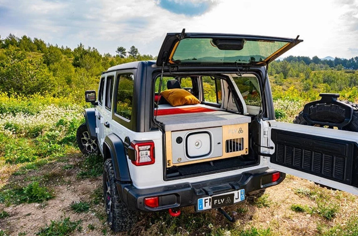 Jeep Wrangler JL 4XE fitted out in wood with a mattress