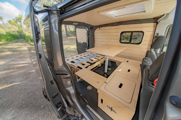 interior of a VAN with floor-to-ceiling wood furnishings