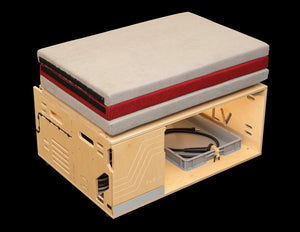 wooden box with folded mattress