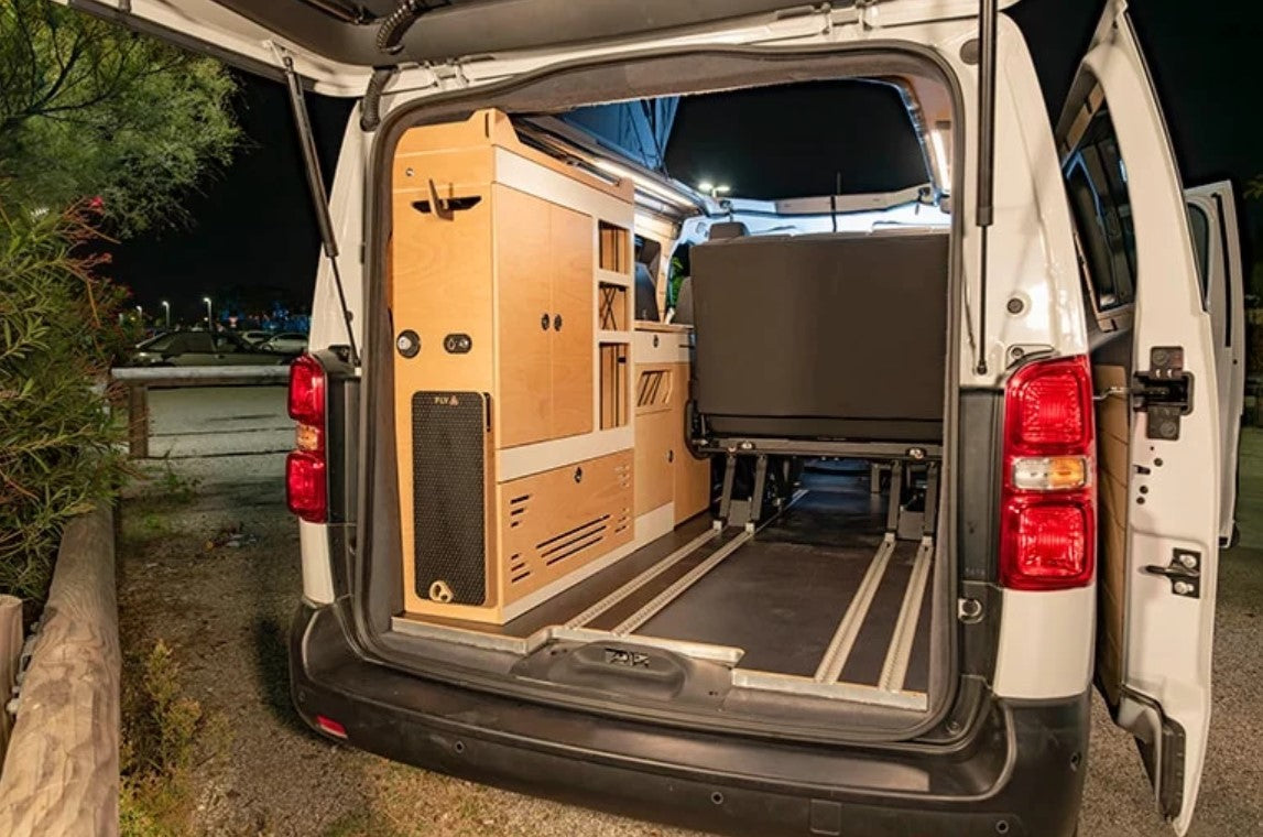 rear view of a van with wooden interior fittings