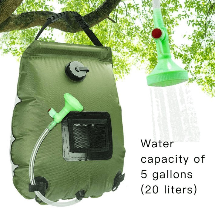 green shower bag hanging from a tree