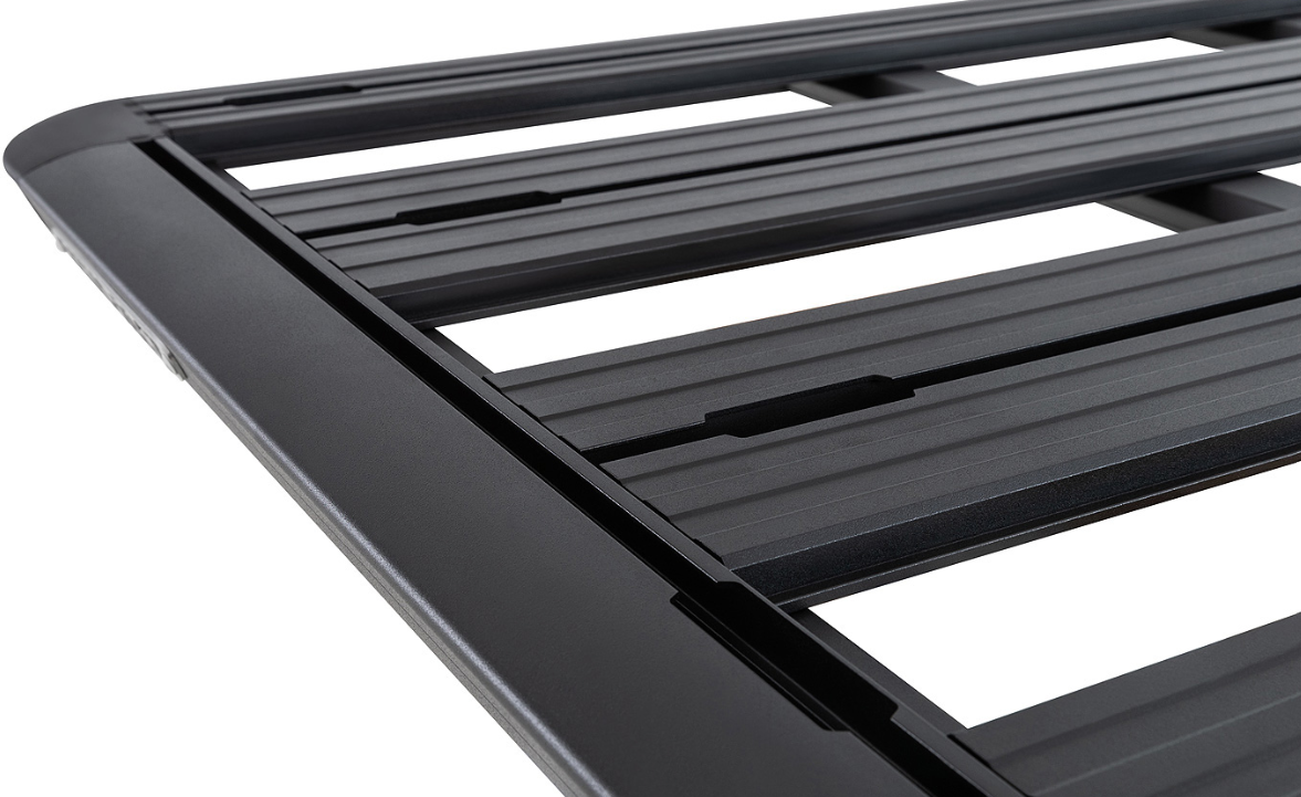 corner top view of a black rhinorack roof rack