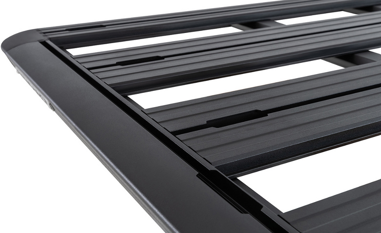 top corner rhinorack of a black roof rack presented on a white background