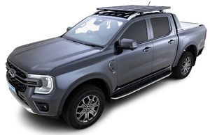 ford ranger latest generation dark blue with black roof rack and bars
