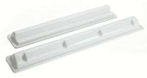 two white plastic bars for mounting solar panels