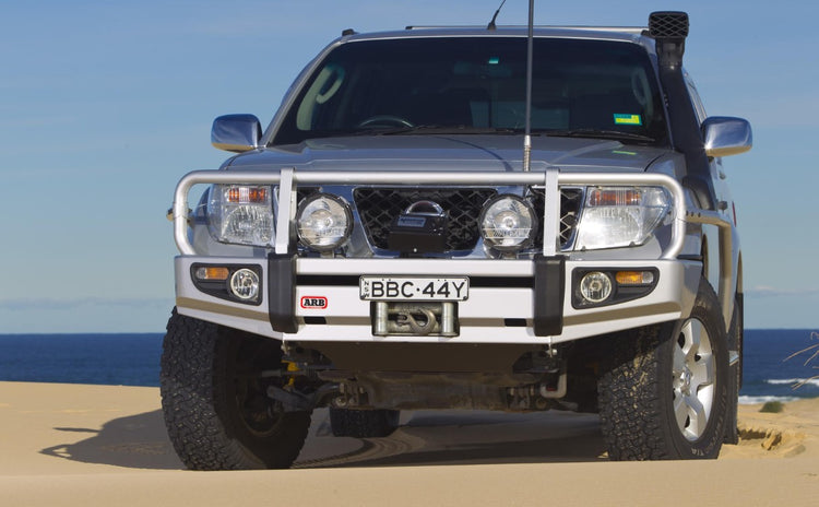 Nissan Pathfinder in the desert with ARB bumper