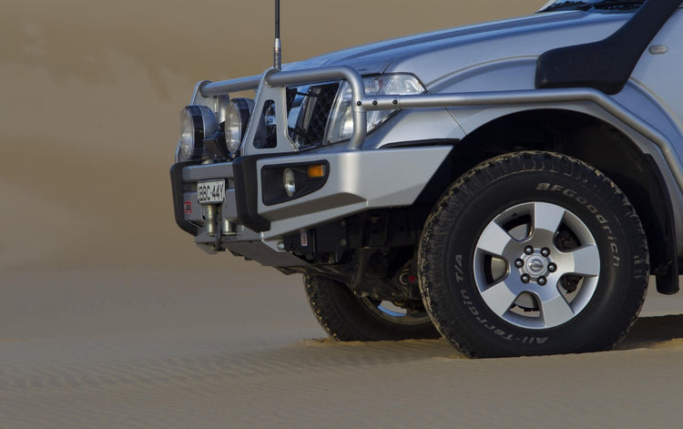 Side view of an ARB bumper on a Pathfinder R51