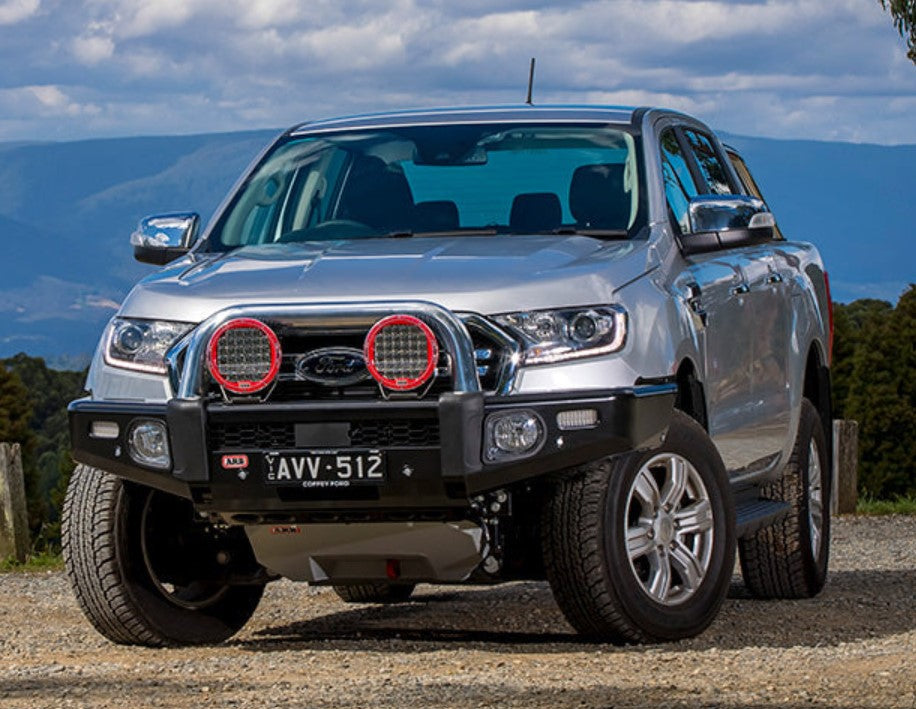 Ford Ranger with black bumper and gray A-Bar in the rocks