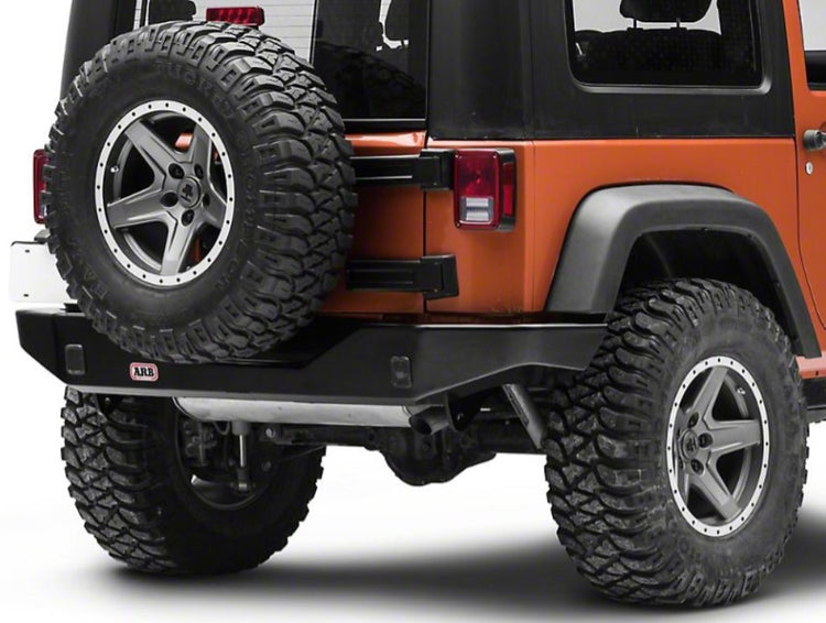 Rear of orange Jeep Wrangler JK with ARB bumper