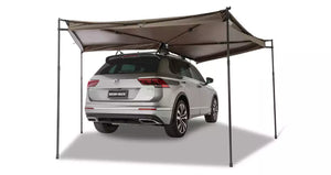 Awning Rhinorack Batwing Compact on the right-hand side of an SUV