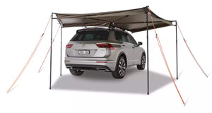 Awning 2m Rhinorack deployed to the right of a Volkswagen