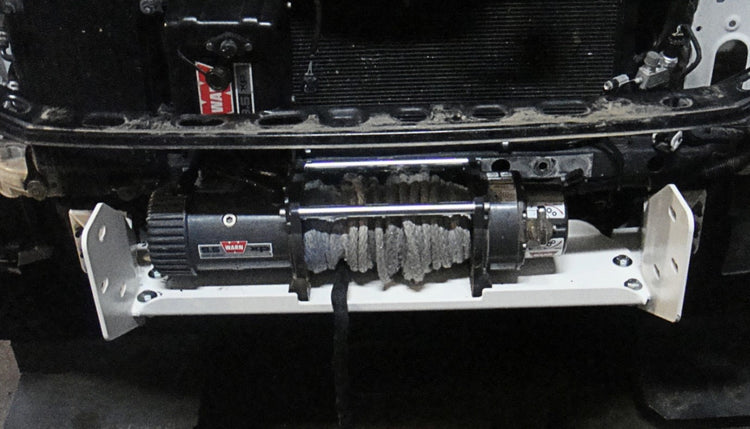 winch mounted on a white winch plate