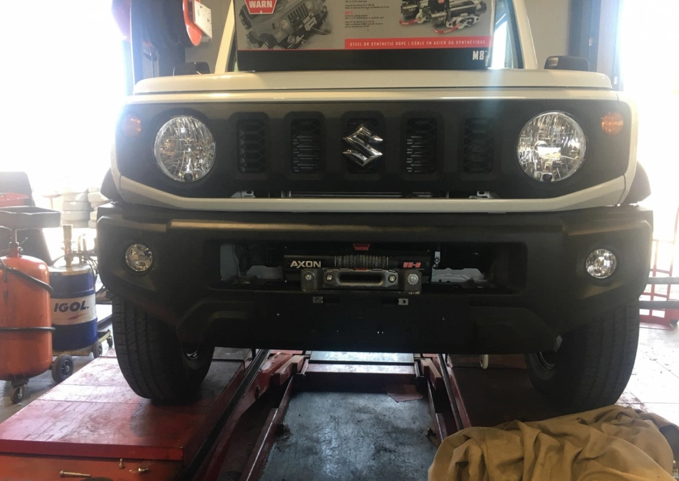 suzuki jimny front view with Axon winch behind the bumper