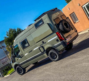 Green Mercedes Sprinter with side vents and rear wheel carrier