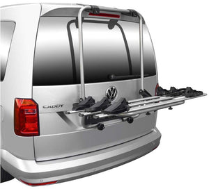 rear view of a volkswagen caddy with bicycle rack