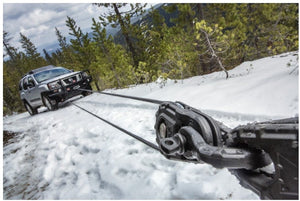 Nissan vehicle towed by winch and pulley block