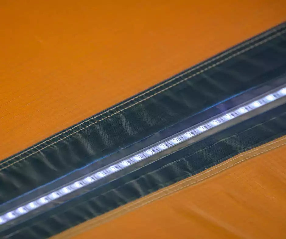 LED strip integrated into the fabric of a Awning ARB Touring aluminium
