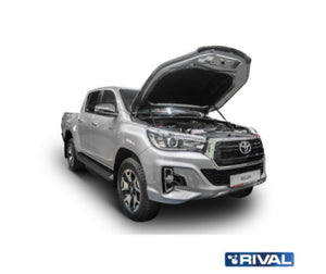 Gray Toyota Hilux Revo with open hood supported by Rival jacks