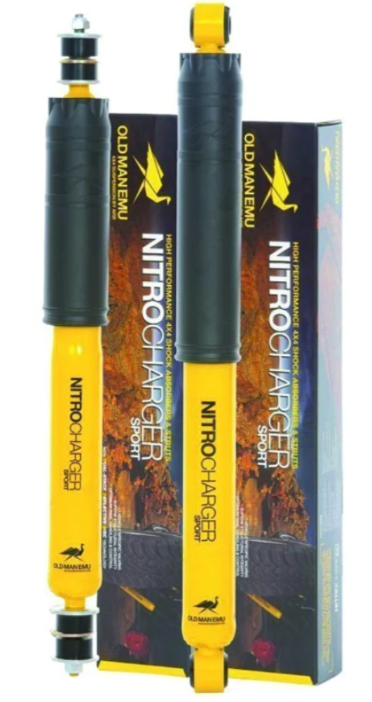 two yellow and black shock absorbers branded nitrocharger OME