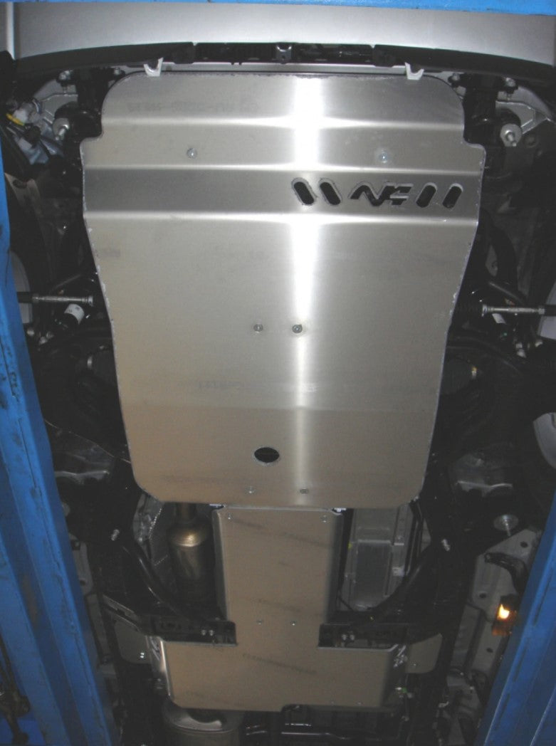 aluminum skid plate attached to the underside of a vehicle