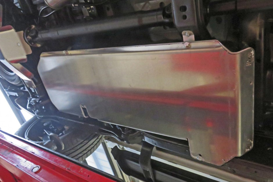 aluminium skid mounted under a vehicle