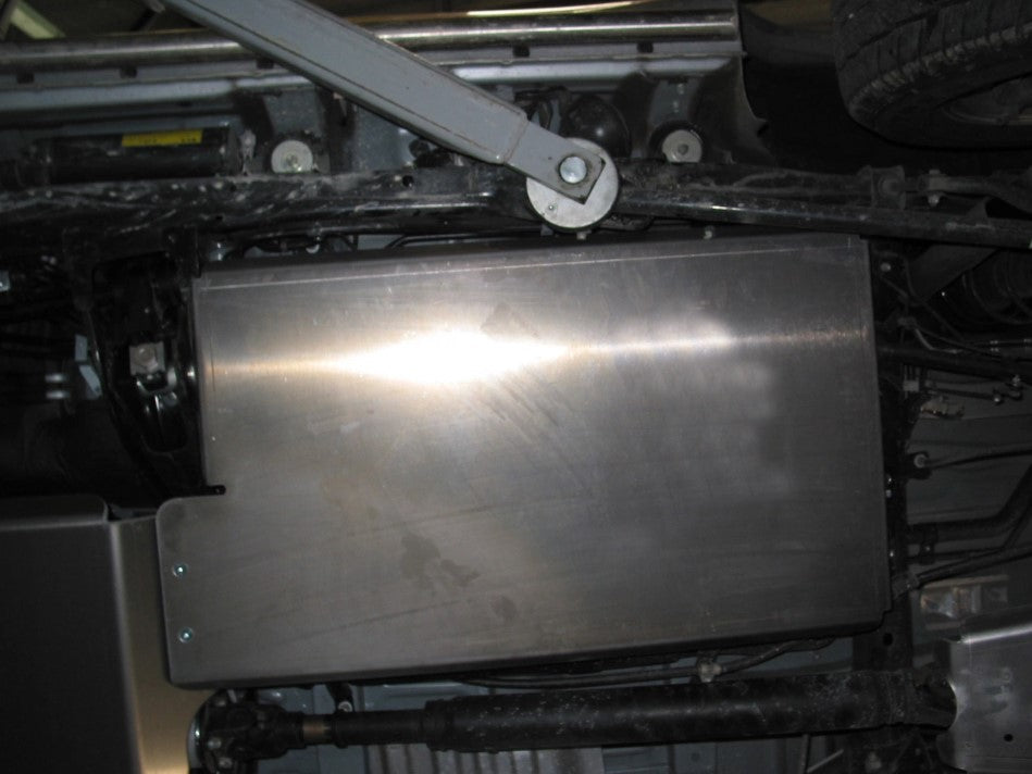 metal tank protector under a vehicle