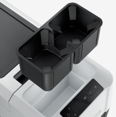 Black cup holder from a dometic fridge