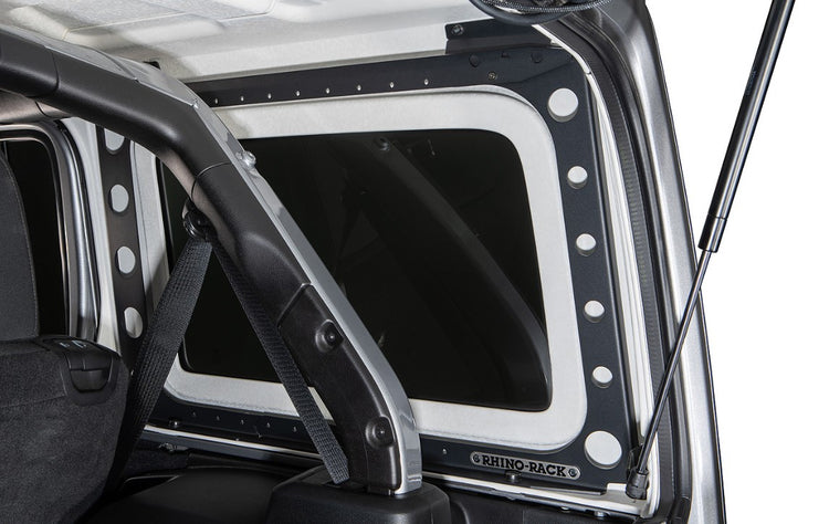 interior of a jeep with a black reinforcing frame