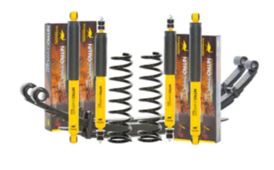 OME suspension kit with white background and yellow shock absorbers
