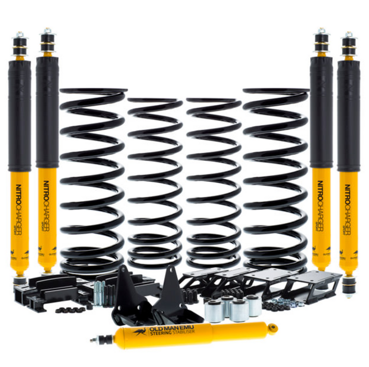 black and yellow suspension kit OME complete spread on a white background