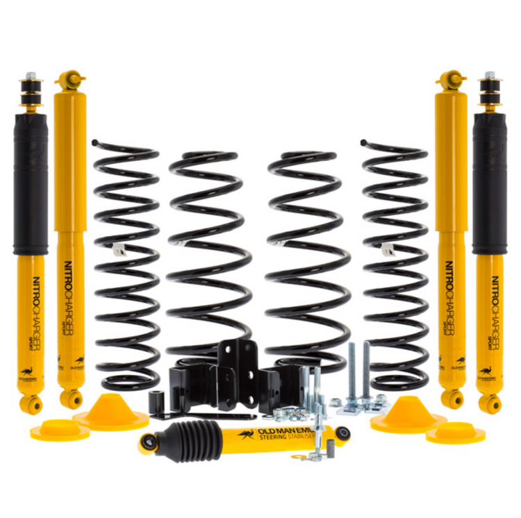 yellow and black suspension kit with shocks and springs on white background