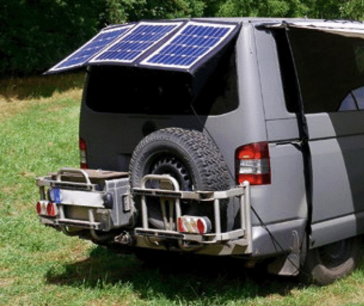 rear view of a grass transporter with rear wheel carrier and solar panel