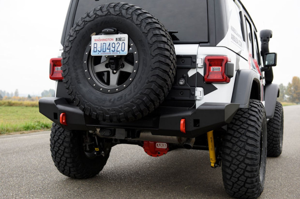 rear view of jeep wrangler jl with spare wheel