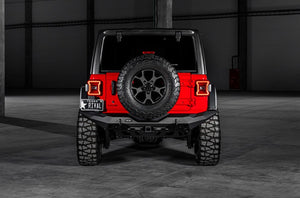 rear view of a red jeep with the rest in black