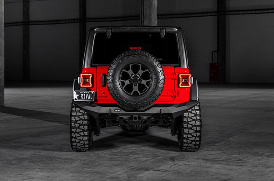 rear view of a red jeep with the rest in black