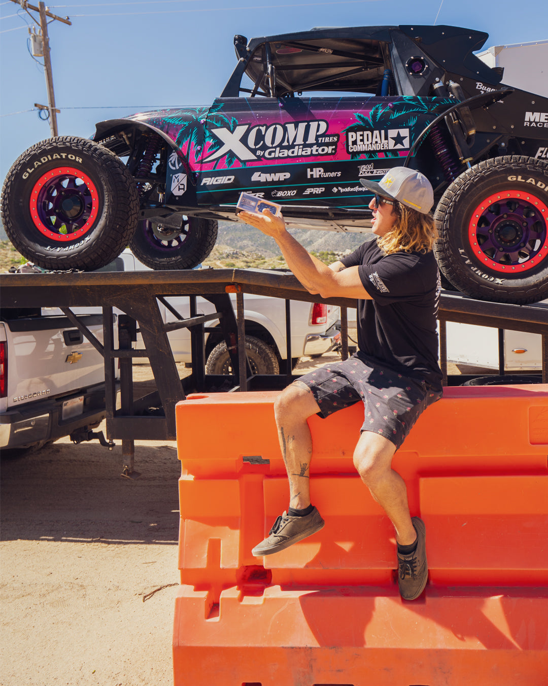 woman in front of a converted vehicle