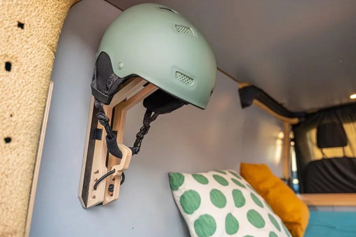 Wall-mounted helmet holder