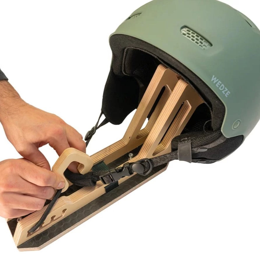 helmet hanging on a helmet holder