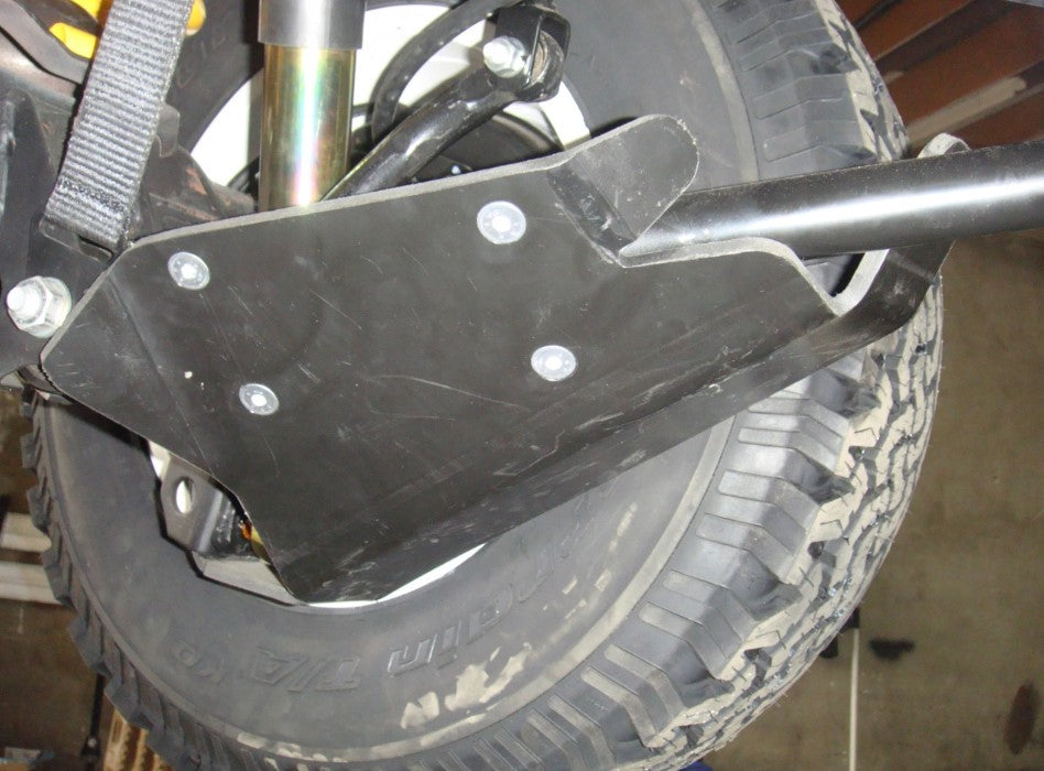 shock absorber protection bolted to a vehicle