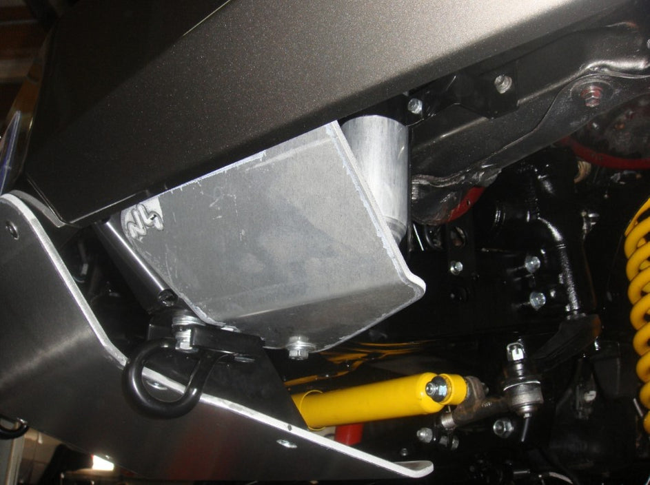 under a clean vehicle with two armors and yellow spring shock absorbers