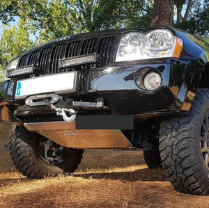 Front of a Jeep Grand Cherokee in the thorns with Almont protection