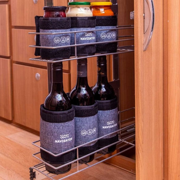 rack with glass jars and bottles