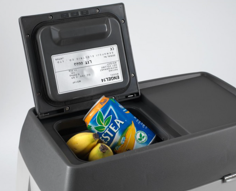 small upper compartment of an open grey engel fridge