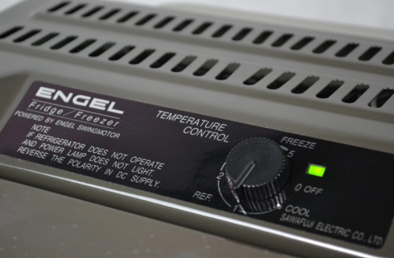 temperature control on a dashboard of a grey engel fridge
