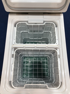 double compartment of an engel fridge with basket on both sides